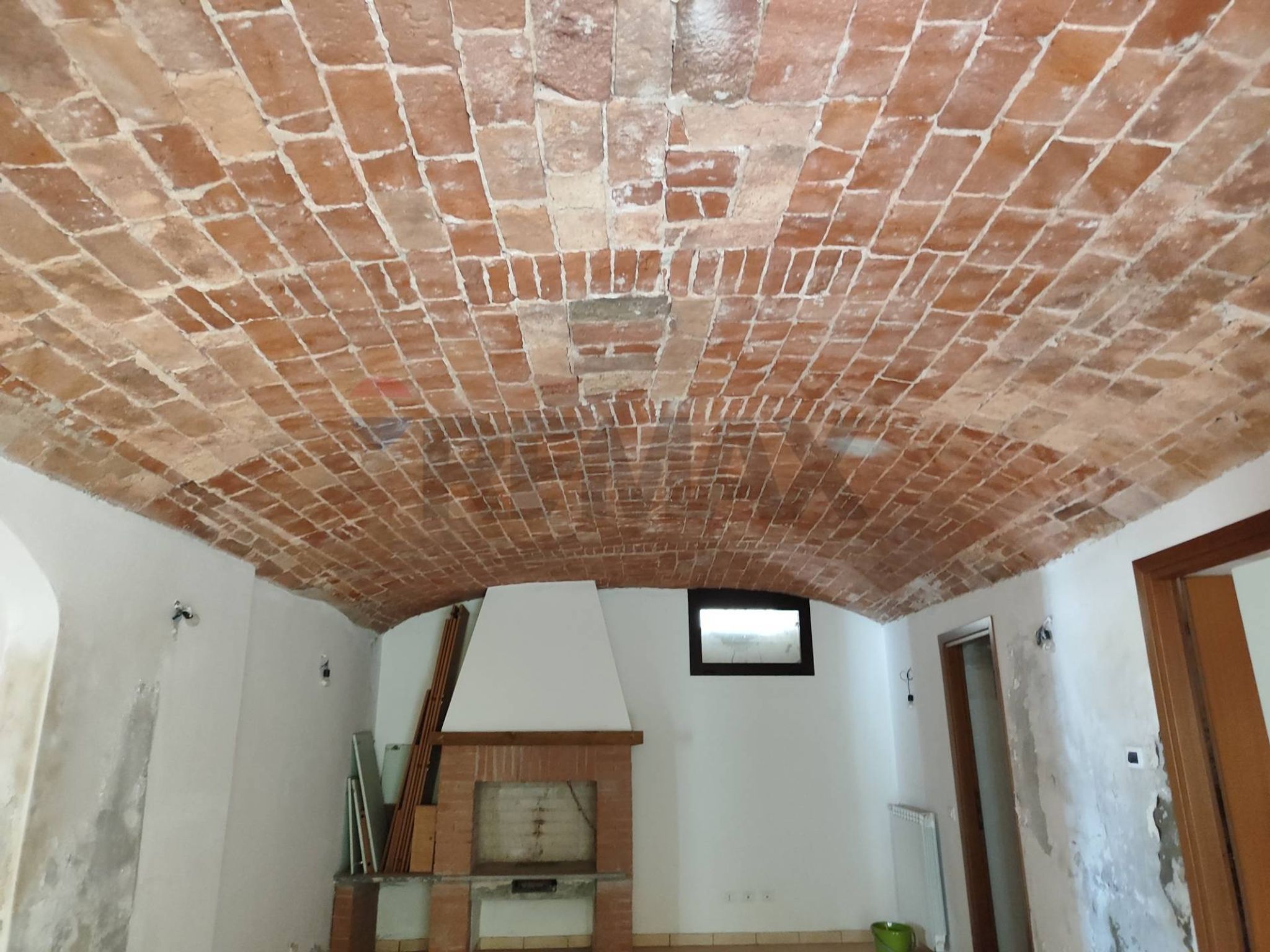 Particolare tetto a mattoni a vista